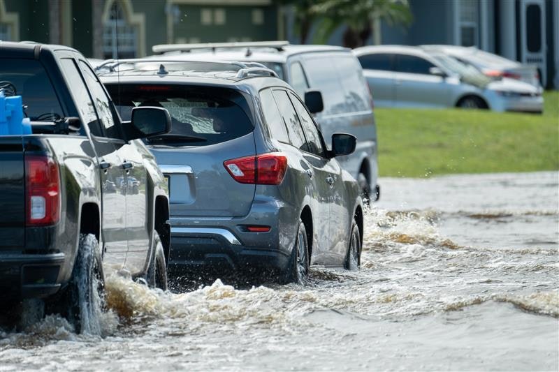 cars on flooded road